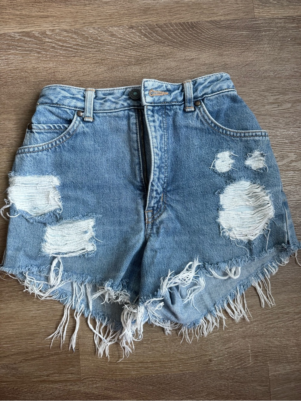 High-Rise Distressed Light Blue Denim Cutoff Shorts